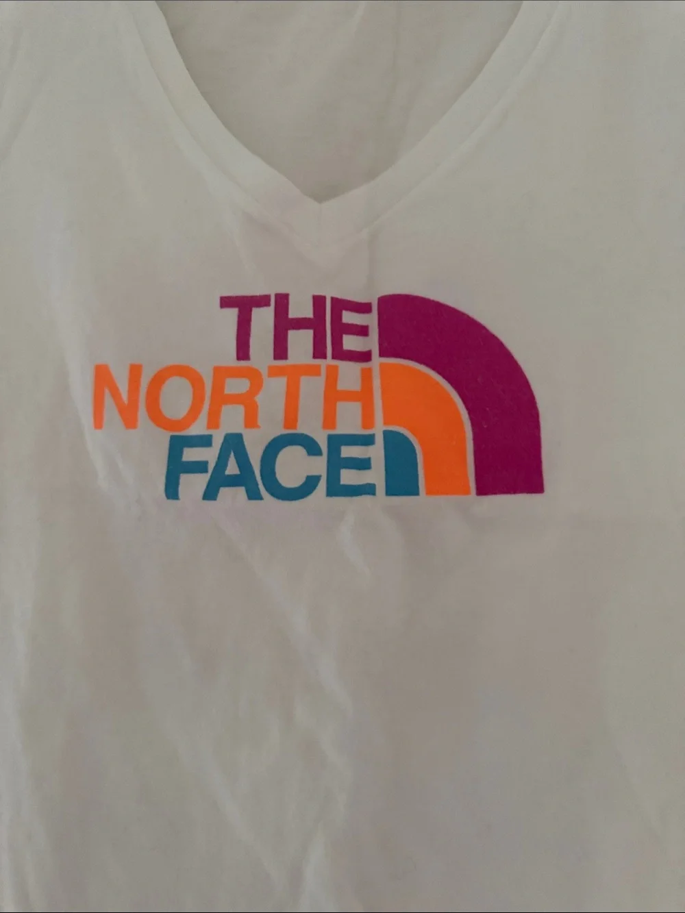 The North Face Women's White V-Neck Logo Tee with Pink, Orange and Blue Graphic - Picture 2 of 4